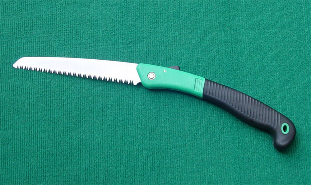 Folding saw with plastic handle